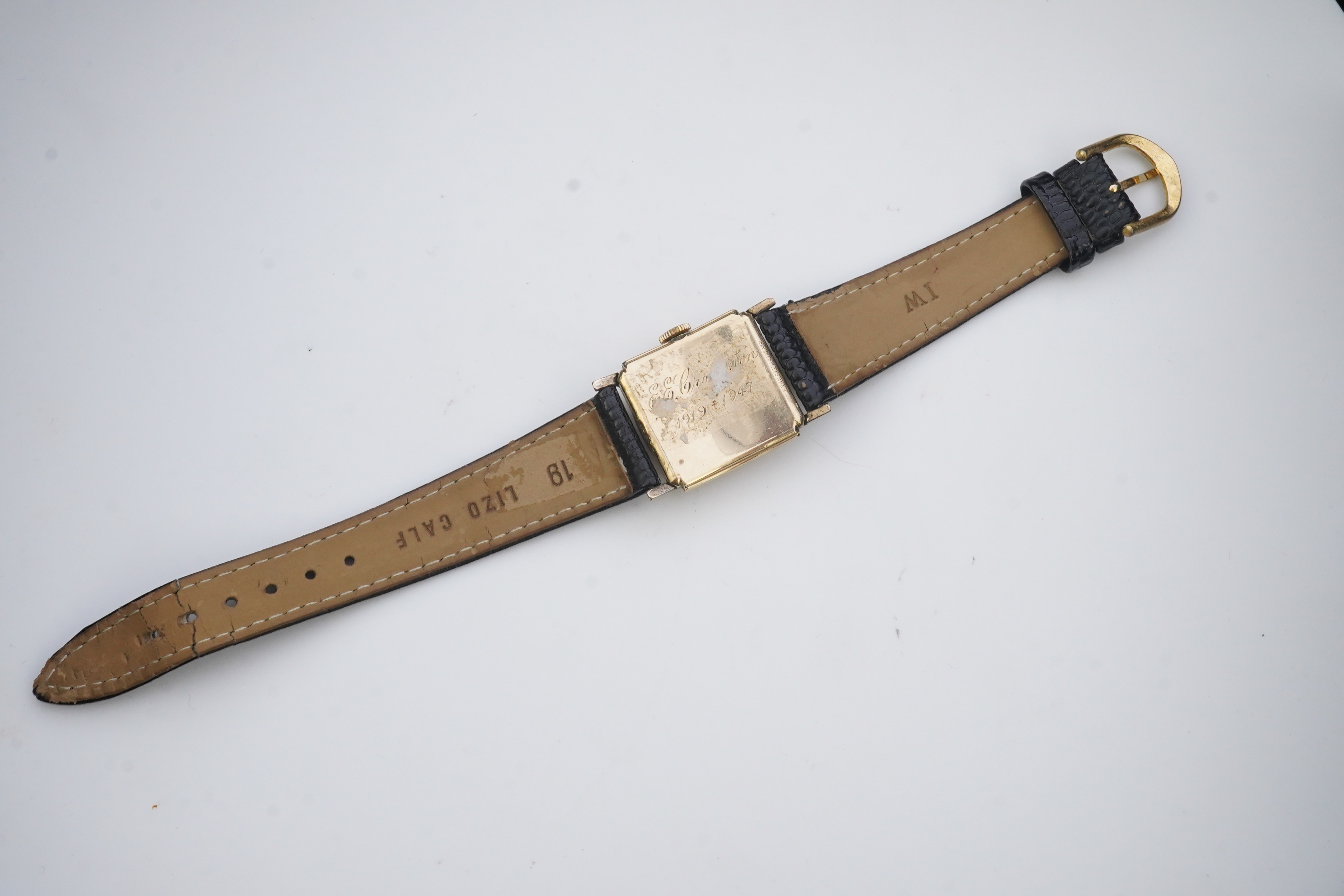 A gentleman's late 1940's gold plated Longines manual wind wrist watch, on a later associated leather strap